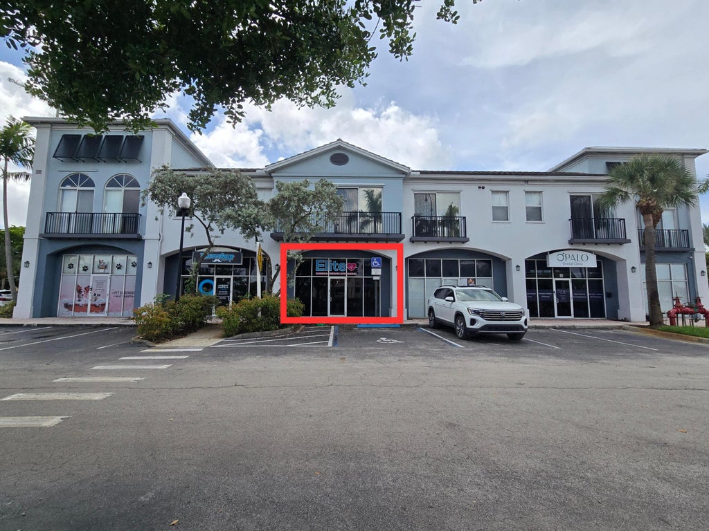 Photo of 3880 W BROWARD Boulevard W, Plantation, FL 33324 (MLS # B26078595)