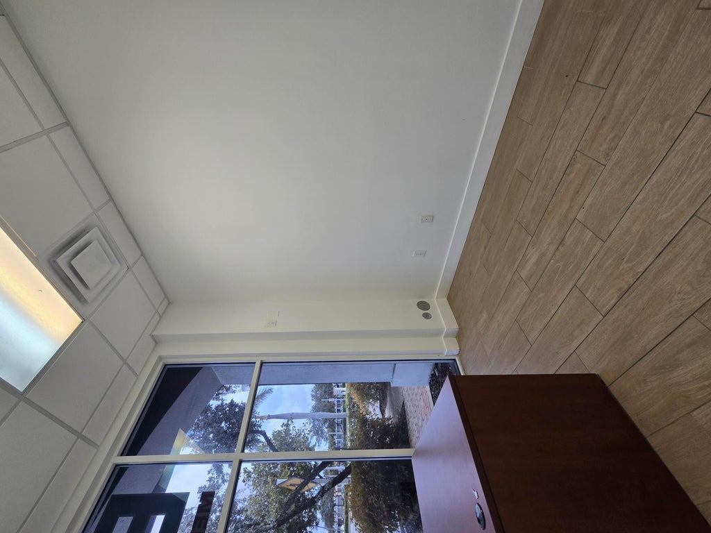 Photo of 3880 W BROWARD Boulevard W, Plantation, FL 33324 (MLS # B26078595)