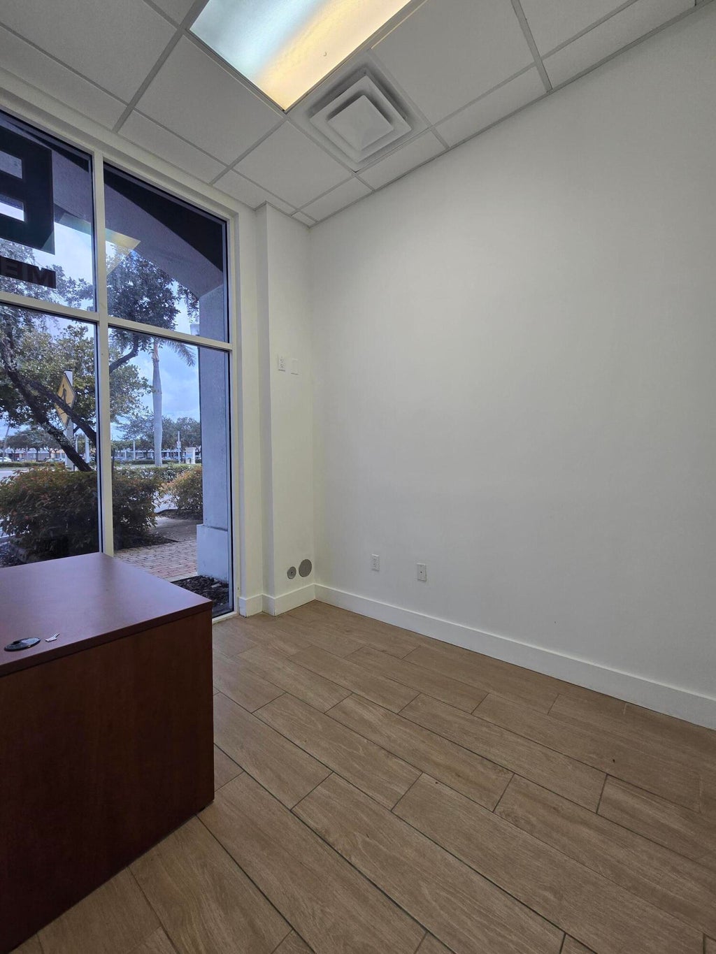 Photo of 3880 W BROWARD Boulevard W, Plantation, FL 33324 (MLS # B26078595)