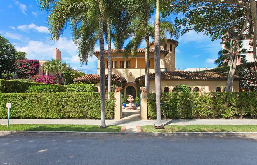 Experience the epitome of luxurious in-town living in this magnificent Mediterranean home. The architectural details are well represented throughout with arched openings, beautiful Cuban tile, and hand painted Pecky cypress ceilings. The wrought iron spiral staircase winds its way up the 40 feet circular tower to a beautiful and spacious Master bedroom. Take in the view on your large open balcony overlooking the lushly landscaped grounds complete with a tranquil fountain. The living room, with a decorative