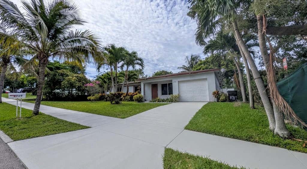 Photo of 1719 15th Avenue N, Lake Worth Beach, FL 33460 (MLS # B26042786)