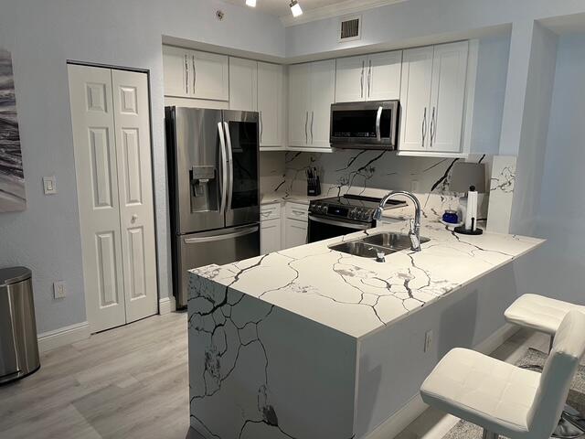 FLAGLER POINTE CONDOMINIUM - Residential Lease