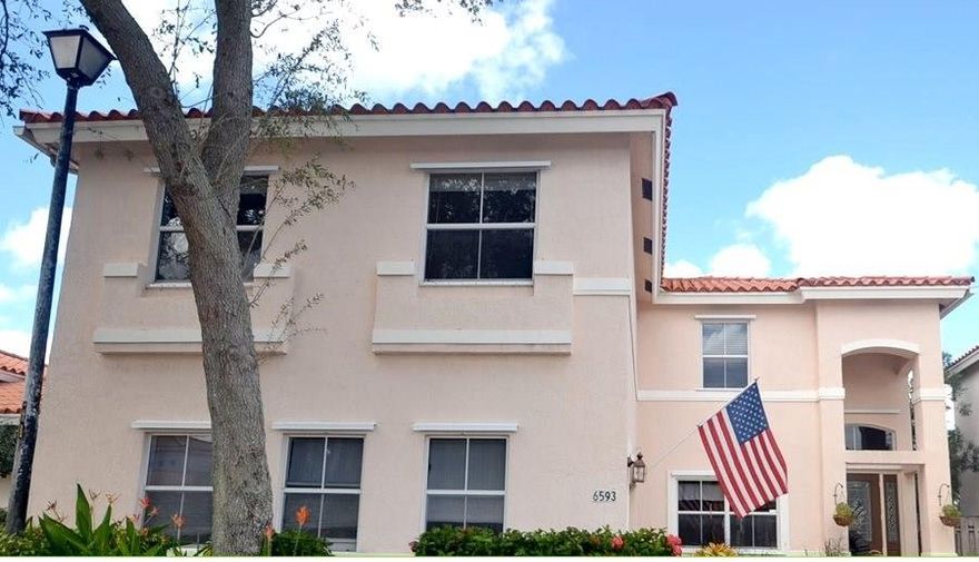 The large kitchen has updated appliances and plenty of cabinet space. You'll love the dining room, complete with stylish fixtures. The bright and airy living room includes a cozy fireplace. The master bathroom has a luxurious tub and dual sinks.