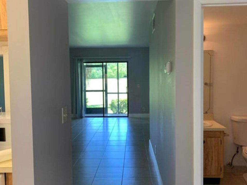 Photo of 7101 Golf Colony Court #104, Lake Worth, FL 33467 (MLS # R10971453)