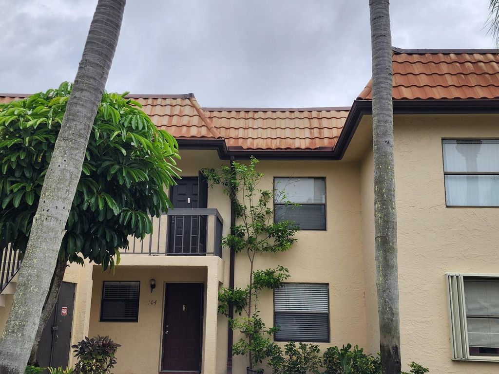 Photo of 7101 Golf Colony Court #104, Lake Worth, FL 33467 (MLS # R10971453)