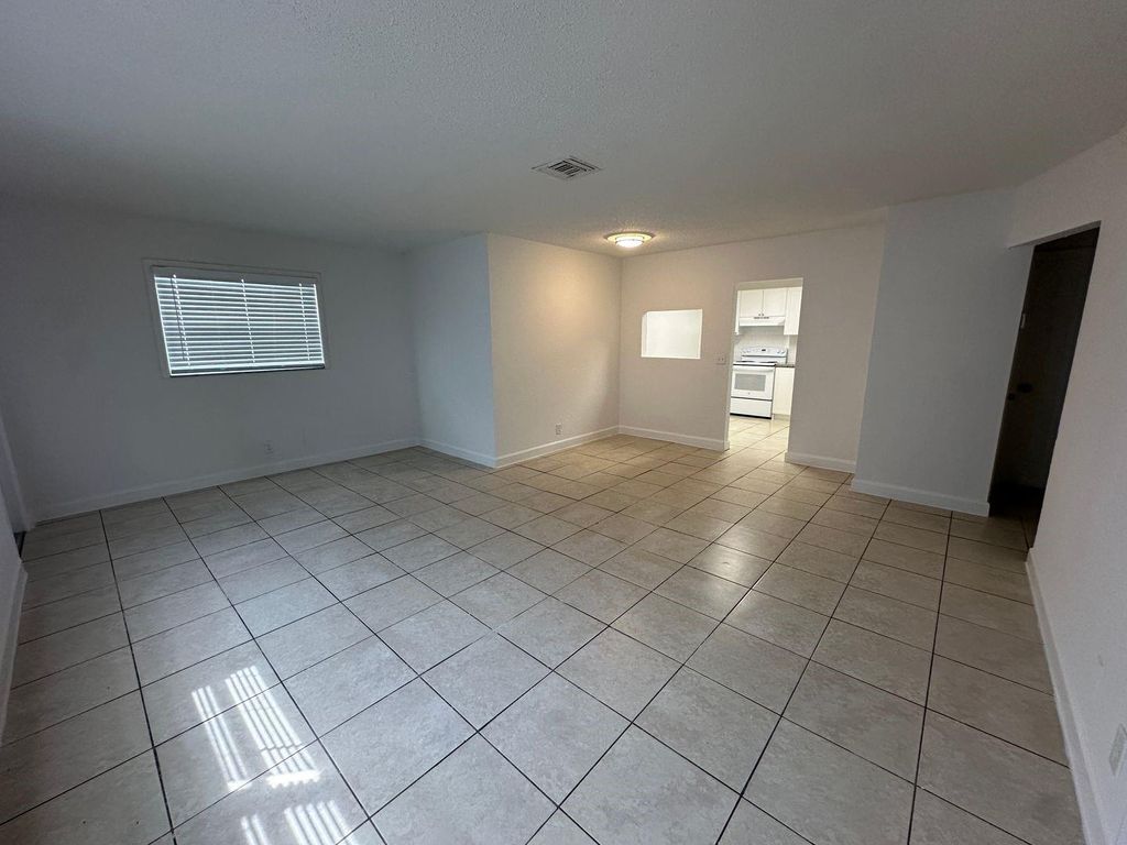 Photo of 3408 Riverside Drive #A, Coral Springs, FL 33065 (MLS # F10507698)