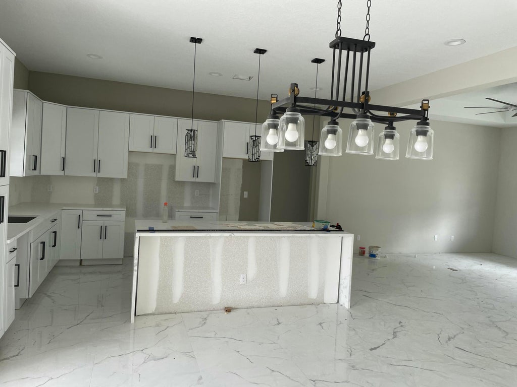 Photo of 6447 NW Fontana Street, Port Saint Lucie, FL 34986 (MLS # B26046328)