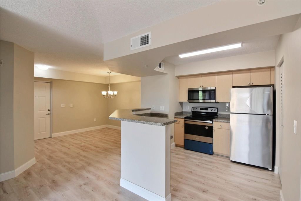 Photo of 3675 NW Mediterranean Lane #303, Jensen Beach, FL 34957 (MLS # R11010016)