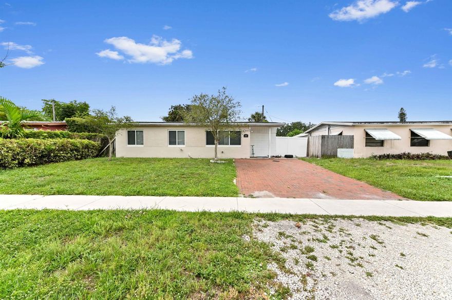New roof (late 2022). Welcome to this charming single-family home located in the heart of Playland Village, a non-HOA community in Davie, FL. This inviting 3-bedroom, 1-bath residence offers the perfect blend of comfort and convenience, making it ideal for first-time buyers, downsizers, or investors. Step inside to find a cozy, well-maintained layout with a bright living space and functional design that caters to everyday living.The kitchen is equipped with sleek granite countertops and white cabinetry, providing a clean and modern feel with plenty of prep and storage space. Each bedroom features its own closet, offering ample storage throughout the home. The bathroom includes a combo tub and shower, making it versatile for all your needs.