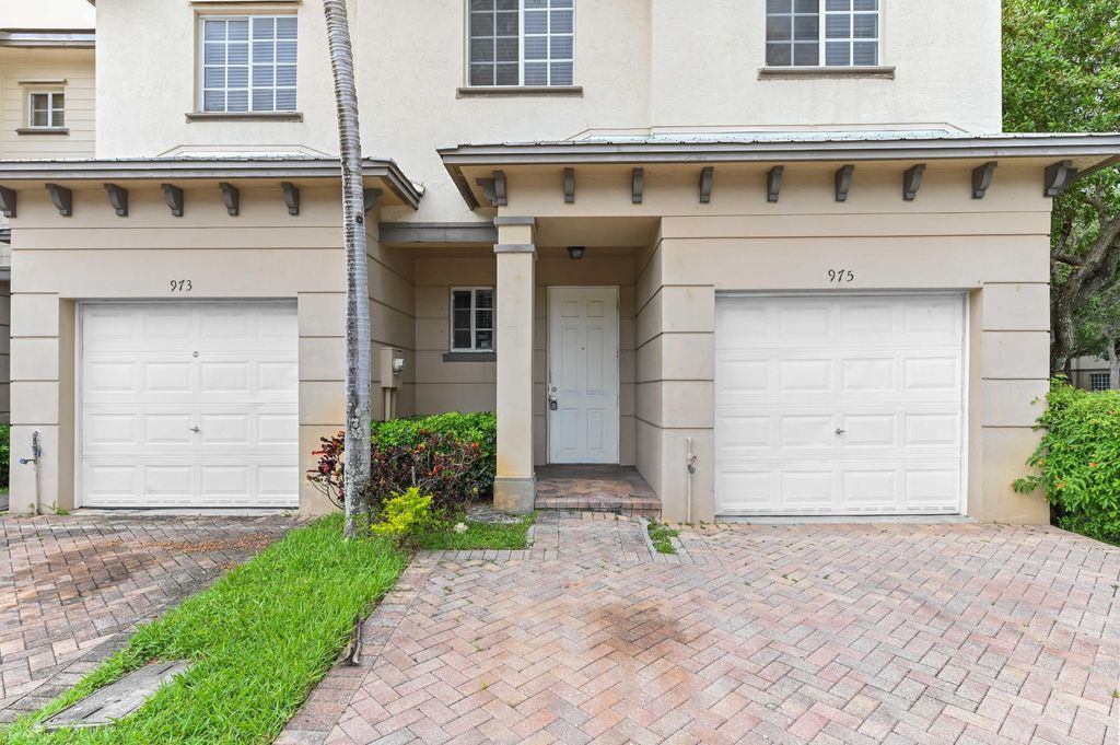 Photo of 975 Tortuga Lane, Riviera Beach, FL 33404 (MLS # R11131341)