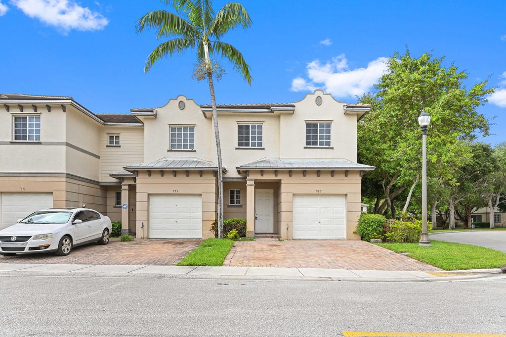 Photo of 975 Tortuga Lane, Riviera Beach, FL 33404 (MLS # R11131341)