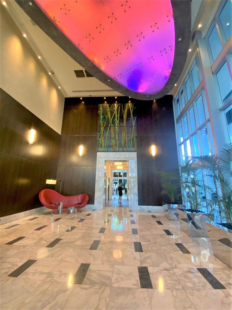 Experience elevated Brickell living at Latitude on the River. Unit 3708 features sleek ceramic floors throughout, creating a modern look that is both stylish and low-maintenance. Enjoy abundant natural light and breathtaking city and river views from your private balcony. The high-floor, open-concept layout offers a functional living and dining space with floor-to-ceiling windows, while the spacious bedroom provides comfort and ample closet space. The kitchen is designed for both everyday living and entertaining, with contemporary finishes and generous storage. Latitude on the River offers resort-style amenities including a fitness center, pool, sauna, 24-hour concierge, valet, and secure access. Located just steps from Brickell City Centre, Mary Brickell Village, and MetroMover access.