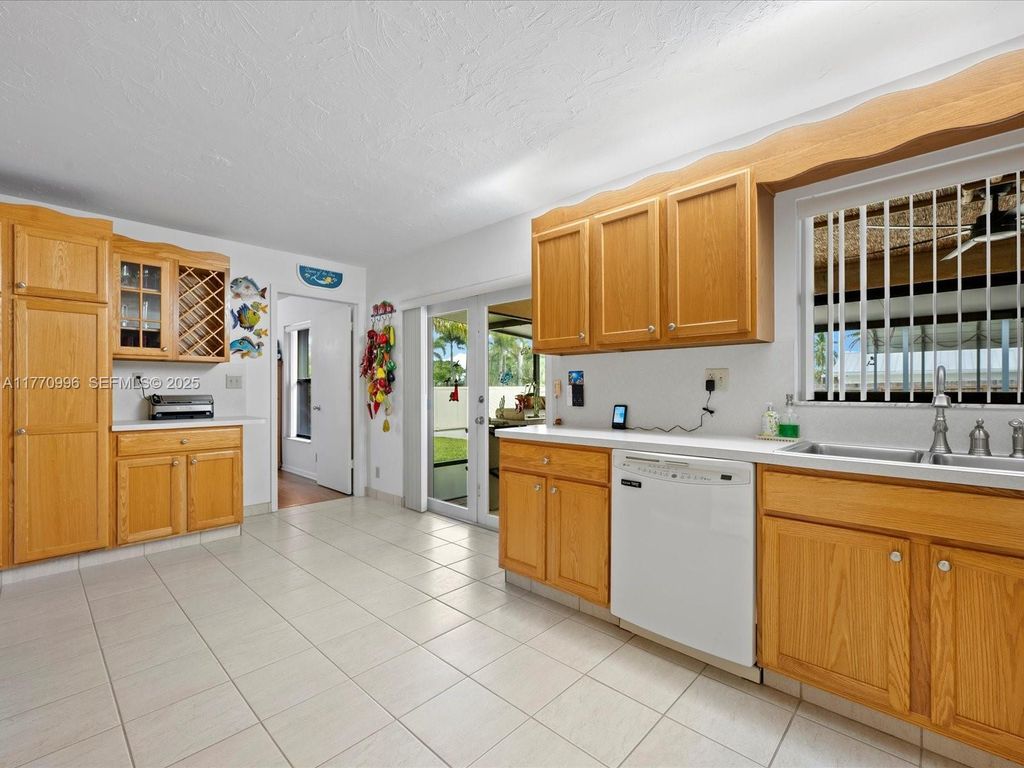 Photo of 102 Chapel Lane, Tequesta, FL 33469 (MLS # R11164640)