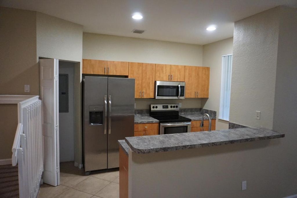 Photo of 1108 Lucaya Drive, Riviera Beach, FL 33404 (MLS # R11127469)