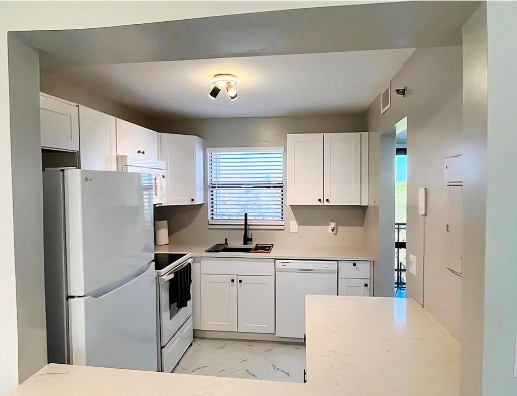 Photo of 4640 W Lucerne Lakes Blvd #505, Lake Worth, FL 33467 (MLS # B26035389)