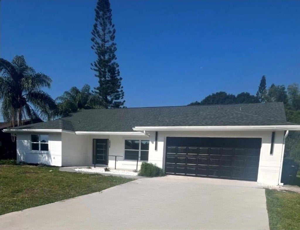 Photo of 2928 SE Bella Road, Port Saint Lucie, FL 34984 (MLS # B26039316)
