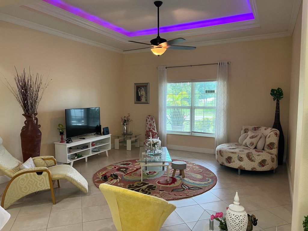 Photo of 6220 NW Sayers Avenue, Port Saint Lucie, FL 34983 (MLS # R10916139)
