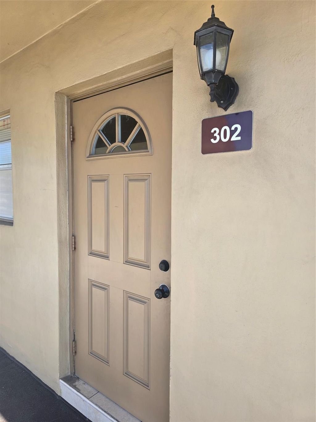 Photo of 5021 W Oakland Park Boulevard #302, Lauderdale Lakes, FL 33313 (MLS # F10554390)