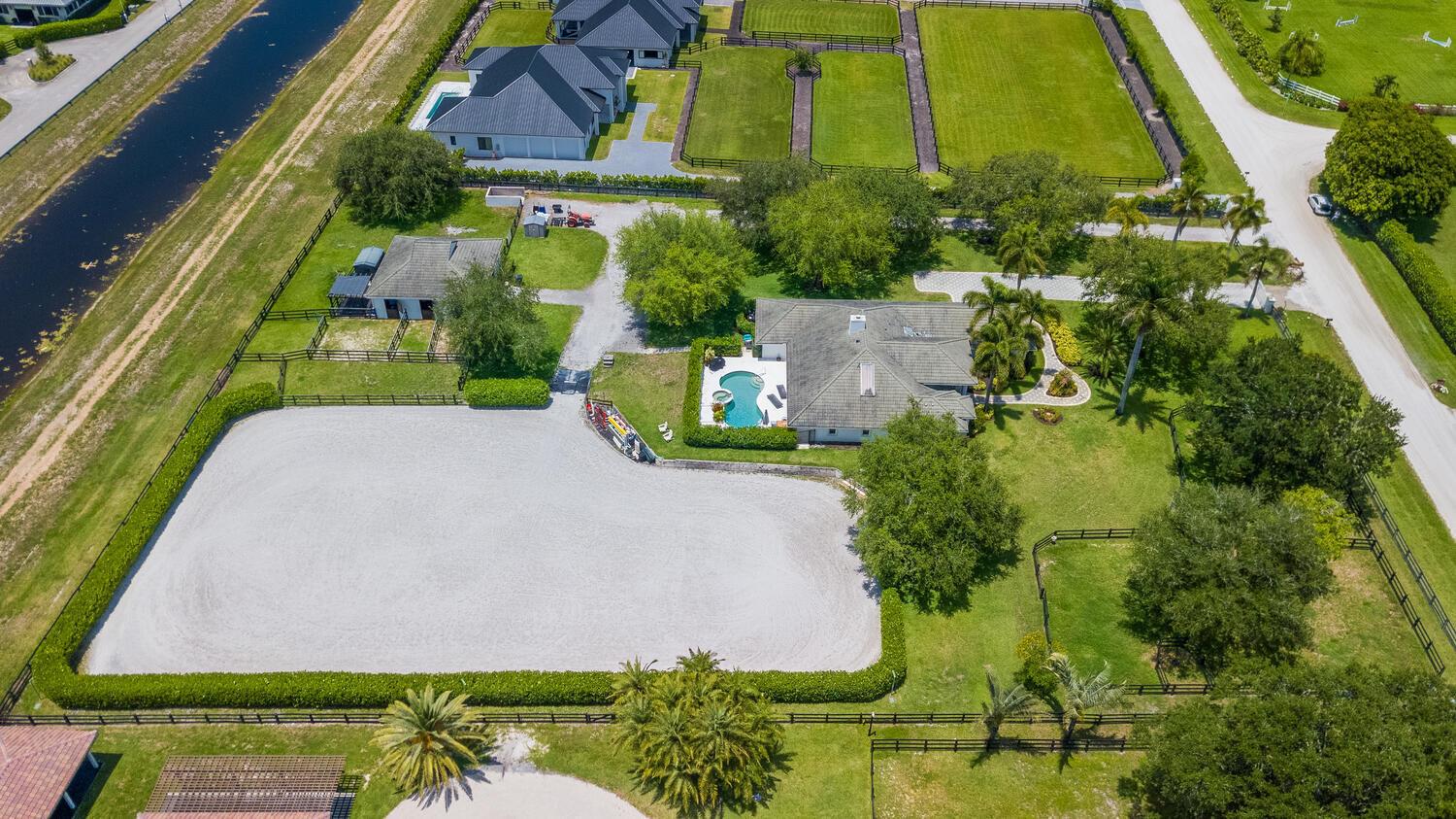 Giving Tree Farm is opening their gates to a special equestrian to enjoy the 2025 / 2026 WEF season. Perfectly located in the sought-after Saddle Trail Park of Wellington, being just a short hack to the show grounds. The main house includes 4 bedrooms and 2 bathrooms, accompanied by a resort-style heated pool and spa. The 4 stall barn is equipped with run outs, air conditioned tack and feed rooms, grassy paddocks, irrigated fiber ring, and plenty of jumps to accommodate. Well behaved pets are welcomed.