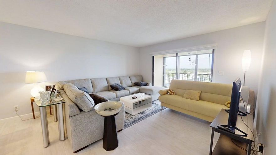 Spacious one-bedroom, 2-full-bath penthouse condo,stunning lake views from the living room and master bedroom. This light and bright unit features beautiful tile flooring throughout, water heater (2021). Enjoy your screened-in balcony overlooking the water. Section 1 of Huntington Lakes—the only section with its own private clubhouse with Pool Jacuzzi & BBQ area. This residence also provides access to the newly renovated main clubhouse. Residents enjoy resort-style amenities including an indoor pool, steam room, sauna, indoor jacuzzi, a fully equipped fitness center with weight and cardio rooms, game & activity rooms, elegant theater showcasing movies, live music, and more. Huntington Lakes offers a vibrant lifestyle with scenic walking paths.