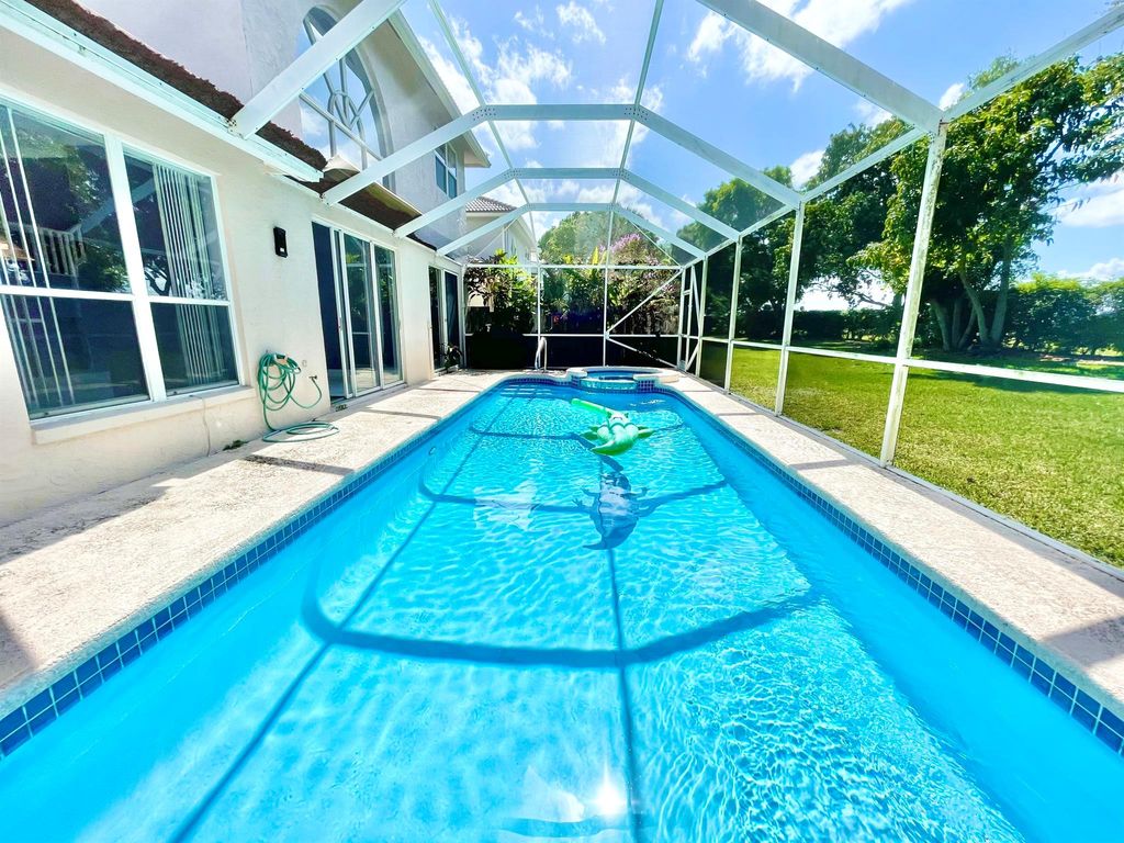 Photo of 10875 Old Bridgeport Lane, Boca Raton, FL 33498 (MLS # R11051512)