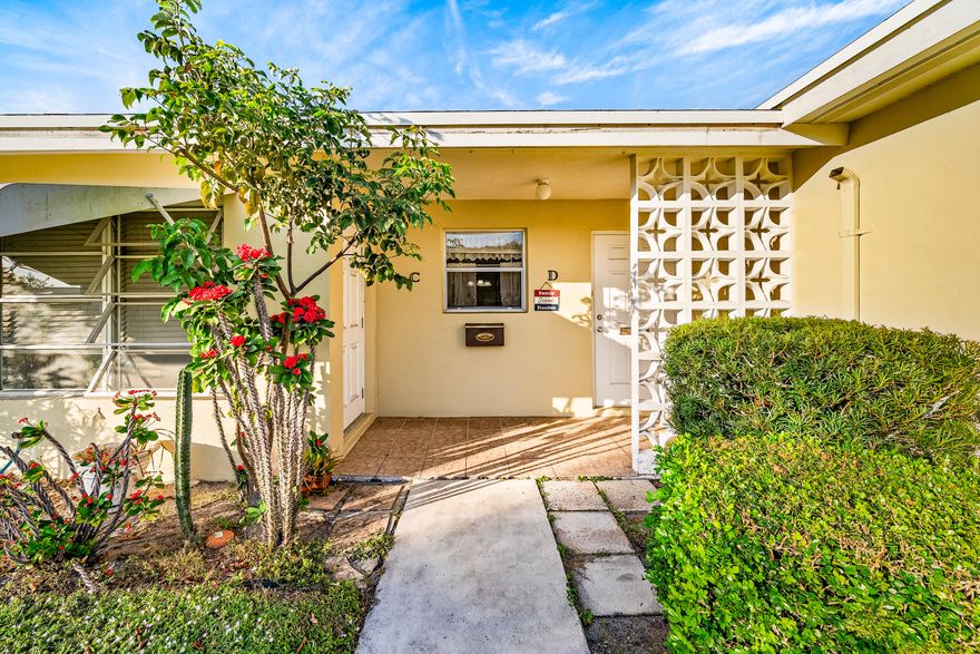 Welcome to this bright and beautifully updated 2-bedroom, 2-bath corner villa in High Point of Delray. Offered fully furnished, this move-in-ready unit is ideal as either a primary home or seasonal escape. The spacious living area features vinyl flooring, elegant crown molding, and updated trim. Enjoy the added living space in the enclosed and raised Florida room. The newly renovated second bathroom showcases fresh finishes, while the primary bath includes a newly installed vanity. The villa offers the ability to install a washer/dryer in the unit. Enjoy added peace of mind with a recently installed new roof. High Point is an active community featuring a pool, clubhouse, and a variety of social events, in addition to its prime Delray Beach location - close to shopping, dining & the beach