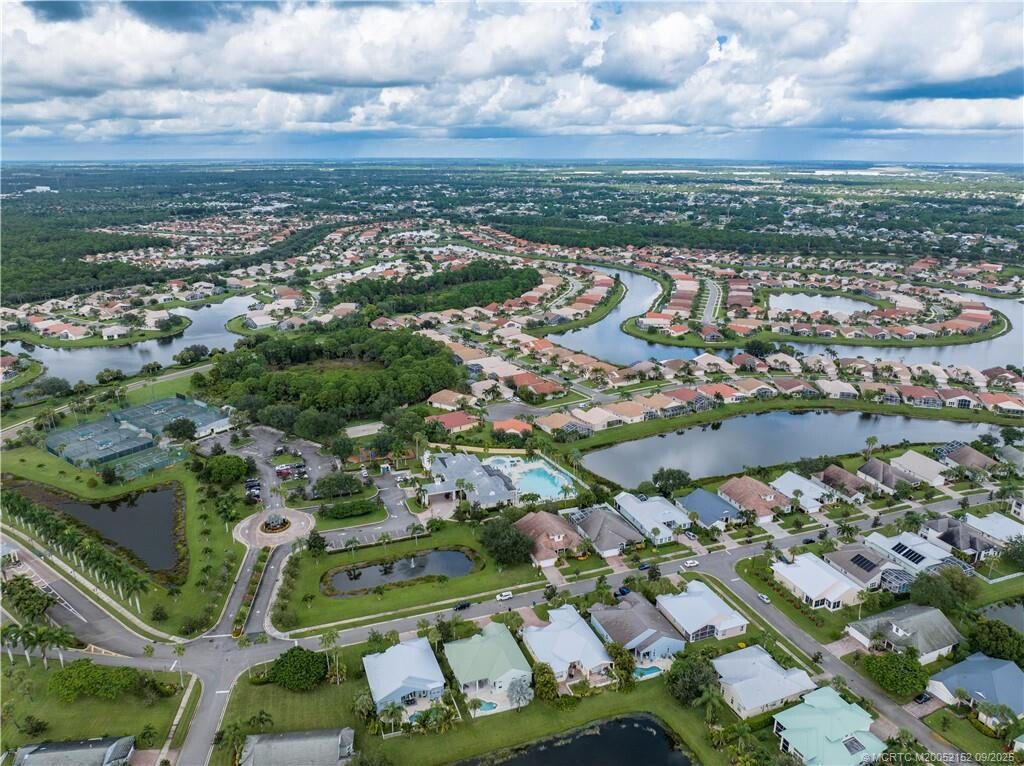 Photo of 127 NW Magnolia Lakes Boulevard, Port Saint Lucie, FL 34986 (MLS # R11161305)