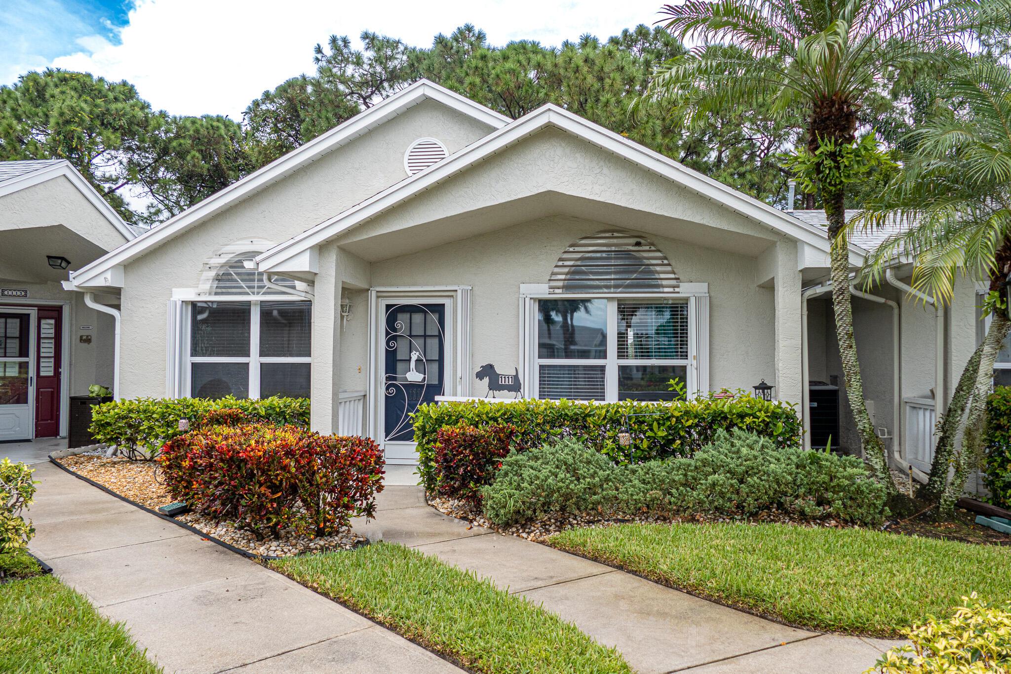 55+ Kings Isle community of Saint Lucie West, this exceptional villa offers 2 bedrooms/2 bathrooms. The home boasts a beautifully updated kitchen equipped with modern appliances, granite countertops, and a cozy eat-in area. The expansive lanai provides serene preserve views, creating the perfect setting for relaxation or entertaining. This villa is further enhanced by robust accordion shutters and a large laundry/utility room featuring 18 feet of additional storage space. 2021 ROOF. Residents of Kings Isle enjoy access to over 40 social and activity clubs, sports courts, a pool, spa, and a vibrant clubhouse, all managed by a full-time staff to enrich the community lifestyle.