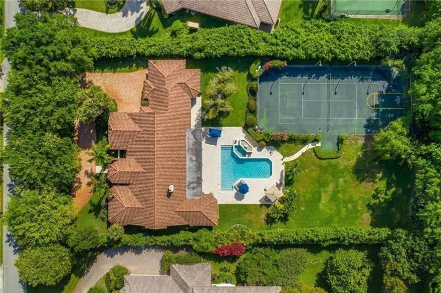 Luxurious residence nestled within the prestigious Long Lake Estates Community  Recently updated single-story home with 5 beds, 4.5 baths on a private 1+acre lot with a 2022 resurfaced Tennis Court & mini soccer field. Other rooms include a huge media/bonus room plus a flex room off the primary suite—perfect for an office, gym, nursery. Heated pool & spa, lush mature landscaping. Marble & porcelain floors, all impact windows/doors & a chef’s kitchen with Carrara marble counters, 42” Wolf gas range, Sub-Zero fridge/freezer, Jenn-Air double ovens, and large island with vegetable sink. Designer finishes and 3-car garage complete this stunning home. Private community offers 24-hour manned & patrolling security.  Excellent A+ Schools. All information deemed accurate but not guaranteed. Luxury estate in prestigious Long Lake Estates on a private 1+acre lot with 24-hour manned & patrolling security. This recently updated single-story home features 5 beds, 4.5 baths, a media/bonus room, plus a flex room off the primary suite—perfect for an office, gym or a nursery. Enjoy an oversized heated pool & spa, resurfaced tennis court 2022 and lush mature landscaping. Interior highlights include marble & porcelain floors, All impact windows/doors, and a chef’s kitchen with Carrara marble counters, 42” Wolf gas range, Sub-Zero fridge/freezer, Jenn-Air double ovens, and large island with vegetable sink. Designer finishes and 3-car garage complete this stunning home. Excellent A+ Schools. All information deemed accurate but not guaranteed.