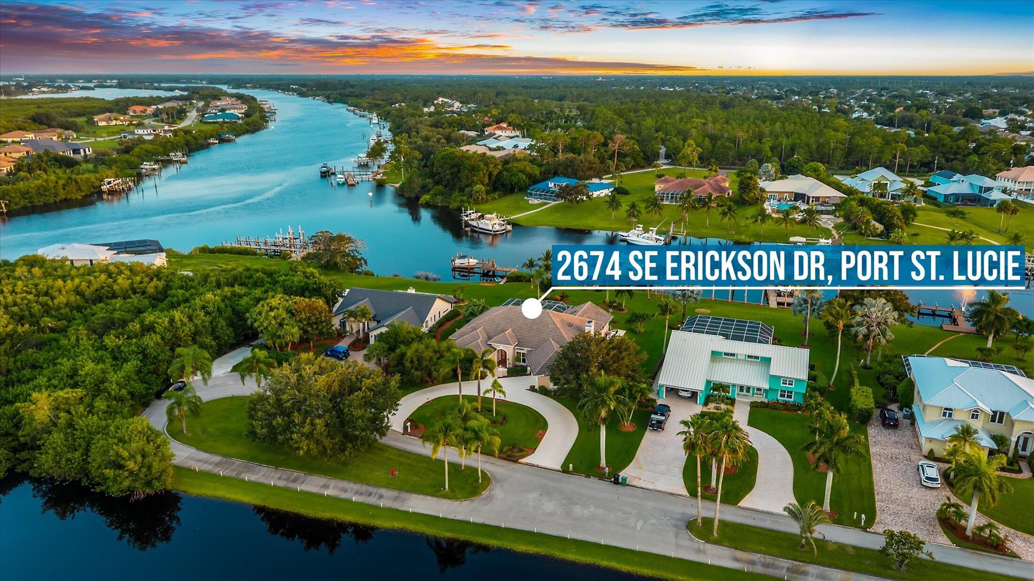 Welcome to your exclusive riverside sanctuary, perfectly positioned on a picturesque peninsula with sweeping mile-and-a-half views down the deep waters of the North Fork of the St. Lucie River--with direct ocean access. This waterfront haven offers over 100 feet of shoreline, a 65-foot dock, ability to accommodate up to 75 ft yacht and a boat lift suitable for a 26-foot vessel, while also comfortably accommodating your yacht and other water toys, with deep water access drawing at least 7.5 feet. Step inside to soaring high ceilings, a spacious split floor plan, and generously sized bedrooms that invite natural light and airiness throughout. The chef's kitchen features solid wood cabinetry, granite countertops, and ample space to entertain.
