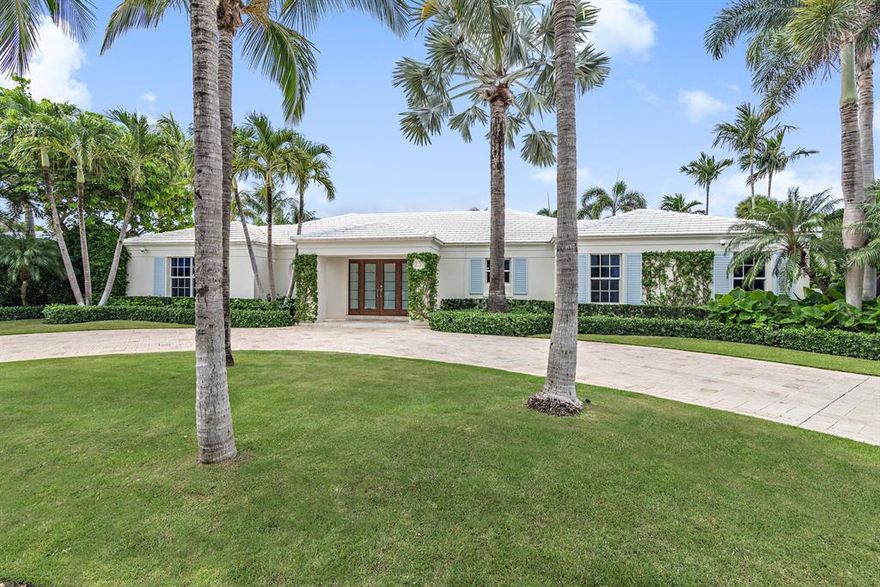 On one of the North End's most desirable streets, this breathtakingly designed home has been completely remodeled. Split floor plan with 4 bedrooms, 4 bathrooms, and two large bright living areas that overlook the expansive covered loggia, pool, and lush landscaping.  Spacious 2-car garage accessible from private alley in rear and direct access to beach and lake trail. Home is being offered furnished.