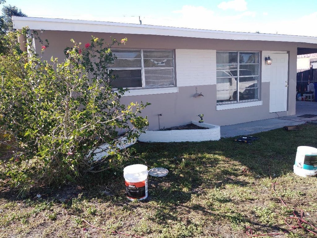 Photo of 649 NW 2nd Terrace, Deerfield Beach, FL 33441 (MLS # F10492345)