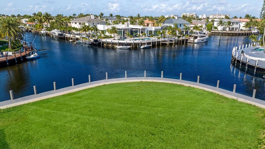 Seize an unparalleled development opportunity in Lighthouse Point with this prime point lot offering 180-degree intracoastal views and easy ocean access. This standout location comes with ready-to-go plans approved for a luxury home, offering you the flexibility to customize, build as proposed, or collaborate on a new design with the seller. The property boasts a newly completed sea wall and dock, setting the stage for immediate development. While the current visuals are artist renderings of the planned residence, they showcase the potential for creating a waterfront haven in one of the most sought-after settings. This is not just a lot but a canvas for creating a bespoke waterfront masterpiece, with groundwork already in place for a swift project commencement. Ideal for builders or visionaries eager to personalize their next luxury abode, it represents a rare chance to craft your dream home in a prestigious locale.

Disclaimer: The information published and provided including but not limited to prices, measurements, square footages, lot sizes, features, finishes, and calculations are subject to errors, omissions or changes without notice.  All such information should be independently verified.  All parties should perform their own due diligence to verify all information.