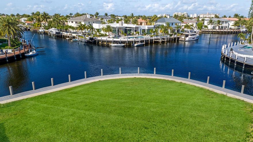 Seize an unparalleled development opportunity in Lighthouse Point with this prime point lot offering 180-degree intracoastal views and easy ocean access. This standout location comes with ready-to-go plans approved for a luxury home, offering you the flexibility to customize, build as proposed, or collaborate on a new design with the seller. The property boasts a newly completed sea wall and dock, setting the stage for immediate development. While the current visuals are artist renderings of the planned residence, they showcase the potential for creating a waterfront haven in one of the most sought-after settings. This is not just a lot but a canvas for creating a bespoke waterfront masterpiece, with groundwork already in place for a swift project commencement.