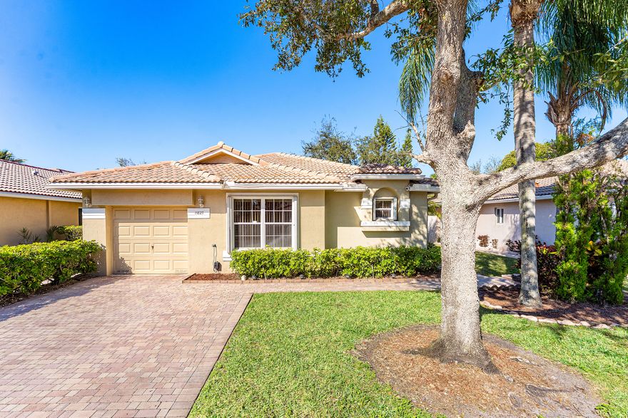 Welcome home to your 3 Bed/2 Bath/1 Car Garage single family home in the gated Egret Walk at Pembroke Pines with serene lake & preserve views. This rare split floor plan of over 1660 sq ft under air allows for maximum function. Upon entering, find bright, open living spaces with neutral tile flooring ideal for everyday life. Kitchen has been updated with wood cabinets, granite countertops, & stainless steel appliances & flows seamlessly into the main living areas via arched doorways with added vaulted ceilings throughout. Primary bed offers lake views, walk-in closets, soaking tub, separate shower, & dual vanities. Beds 2 & 3 share spacious bath. Screened patio overlooks the lake for quiet relaxation. Home is in close proximity to essentials, including shopping, dining, schools, & parks.