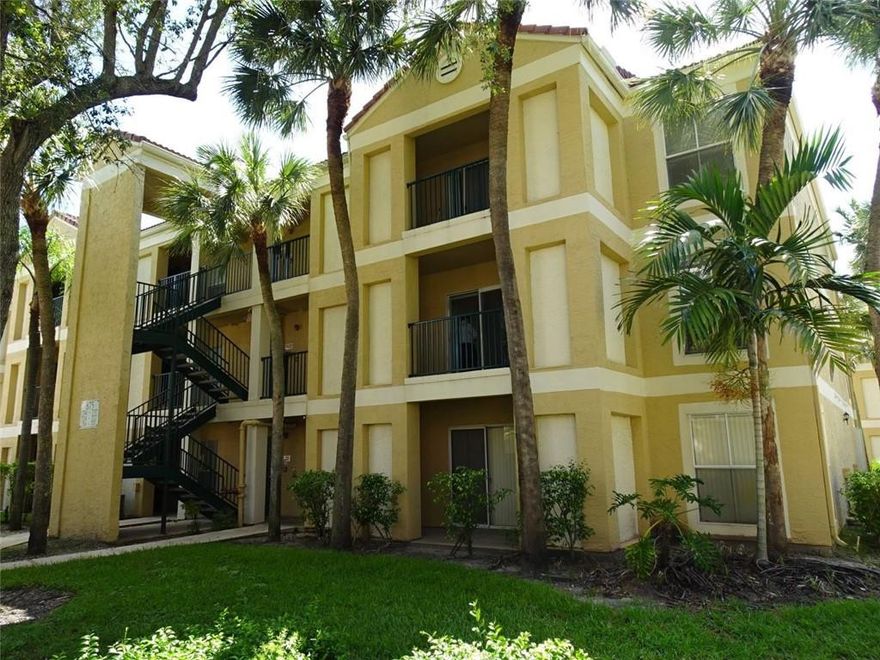 Spacious  second floor Corner unit 2/2  tiled, with walk-in closets, laundry with full size washer/dryer,  lots of extra closets, balcony with pool view, 2 assigned spaces. Near Mall, post office, major roads, movies, dining and more!VACANT AND EASY TO SHOW. CLEAN AND MOVE IN READY.