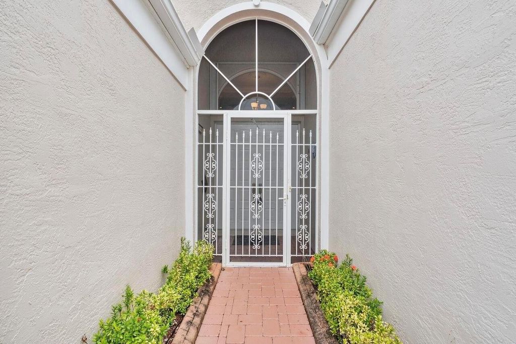 Photo of 8351 Mastic Cay, West Palm Beach, FL 33411 (MLS # R11096571)