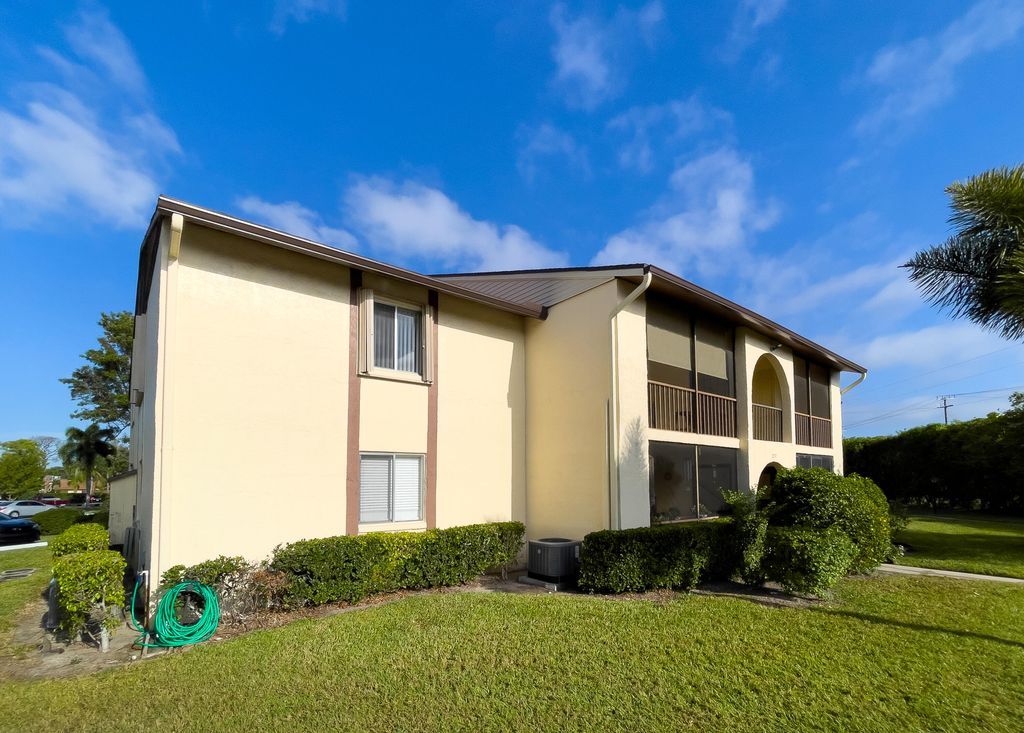 Photo of 317 Knotty Pine #C2, Greenacres, FL 33463 (MLS # B26000805)