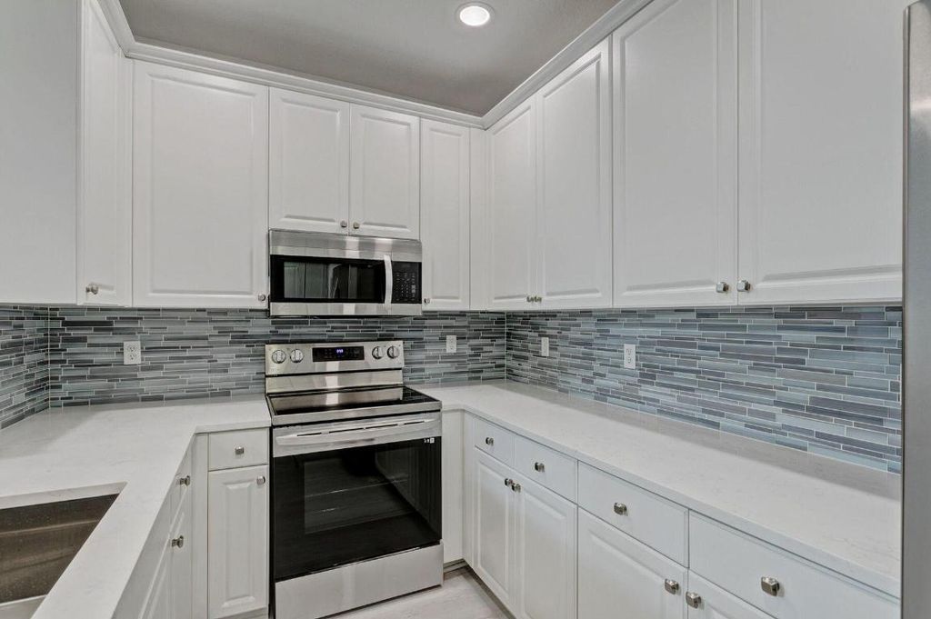 Photo of 1455 Cades Bay Avenue, Jupiter, FL 33458 (MLS # R10954724)