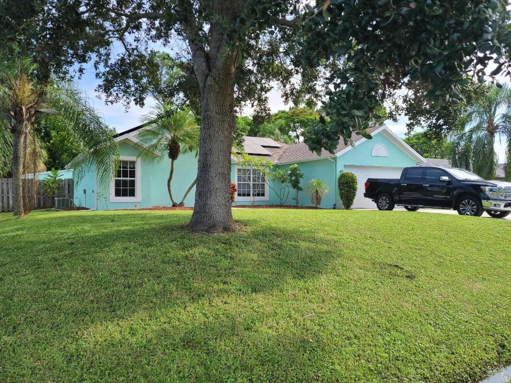 Photo of 1231 SW Porter Road, Port Saint Lucie, FL 34953 (MLS # R10926999)