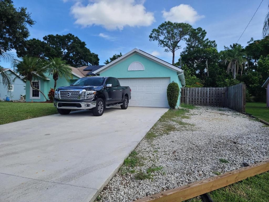 Photo of 1231 SW Porter Road, Port Saint Lucie, FL 34953 (MLS # R10926999)