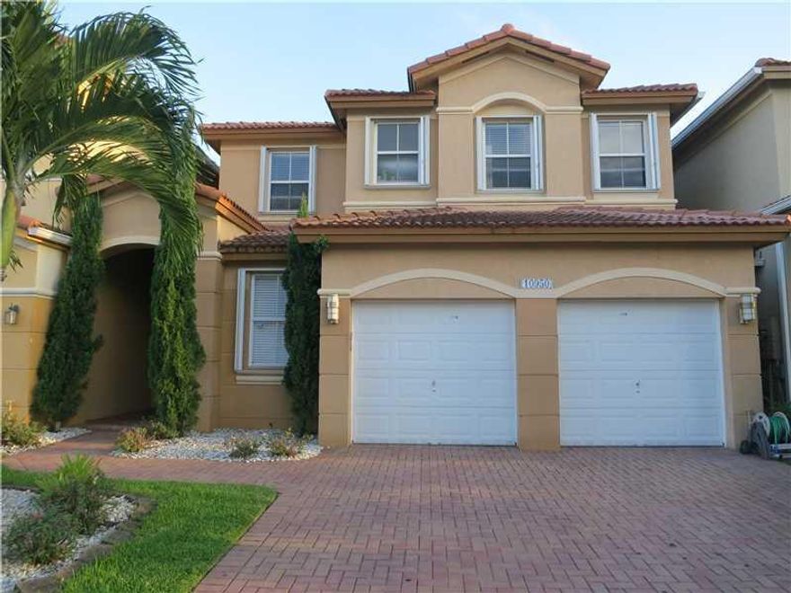 THIS HOUSE IS UNIQUE IN A GREAT LOCATION!DORAL IS EXPANDING WITH ALL SORTS OF BUSSINESS!TAKE ADVANTAGE OF THIS GORGEUS HOME NEAR SWIMMING POOL, 4/3 WITH 2 CAR GARAGE, HURRICANE SHUTTERS, GRANITE COUNTER TOPS, STAINLESS STEEL APPLIANCES! ONE BEDROOM AND A BATHROOM DOWNSTAIRS, LAMINATE FLOORING THROUGHOUT, PATIO AND MORE. GREAT SCHOOLS IN A WALKING DISTANCE. EXCELLENT PLACE TO RAISE A FAMILY. OWNER IS MOTIVATED