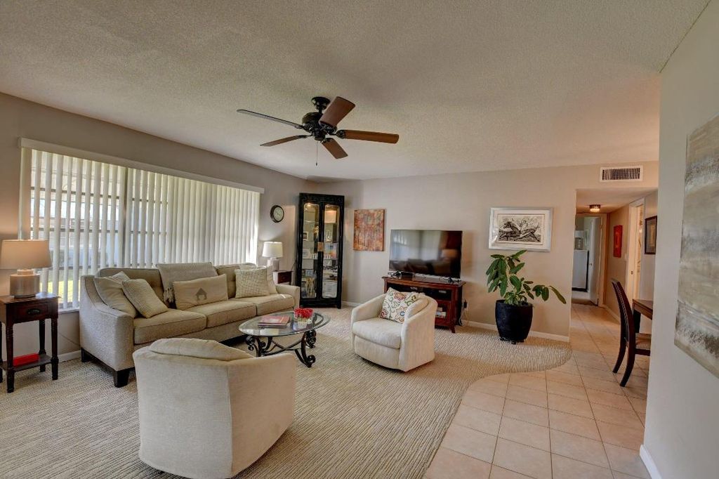 Photo of 230 High Point Court E #Apt A, Delray Beach, FL 33445 (MLS # R10986999)