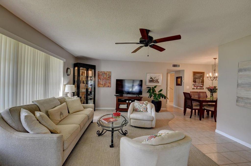 Photo of 230 High Point Court E #Apt A, Delray Beach, FL 33445 (MLS # R10986999)