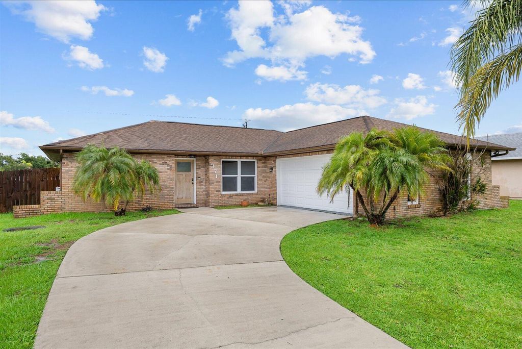 Photo of 371 SW Butler Avenue, Port Saint Lucie, FL 34983 (MLS # B26034870)