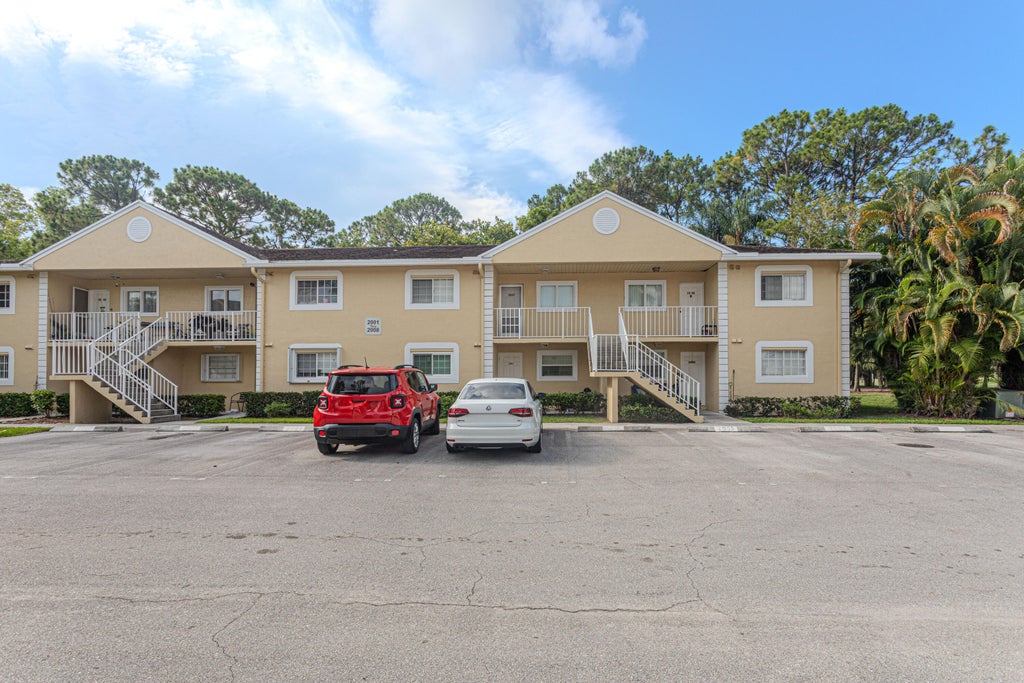 Photo of 2007 Palm Beach Trace Drive #2007, Royal Palm Beach, FL 33411 (MLS # B26061154)