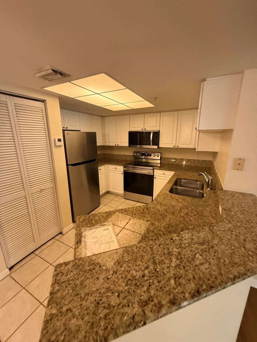 Located in the prestigious Grand View at Crestwood Complex. The unit itself has many upgrades, stainless steel appliances throughout the kitchen, all brand, new fans and light fixtures, LED throughout the unit and freshly painted Garage along with epoxy floor.The gated community offers resort-type amenities such as 2 Pools, Fitness Center, Tennis Court, Playground, Kids Court, many Picnic Areas, Walk/Jog Trail, and 24h/7 Security Cameras. Centrally located between Southern and Okeechobee Blvd. We are near Turnpike, Equestrian facilities, Wellington Mall, Publix, Duffy's, Sal's Italian, Burger King, ABC Fine Wine, Walgreens, Hair Salon, Nail Salon, and much more. Come to see it before someone else takes it! Easy to show!