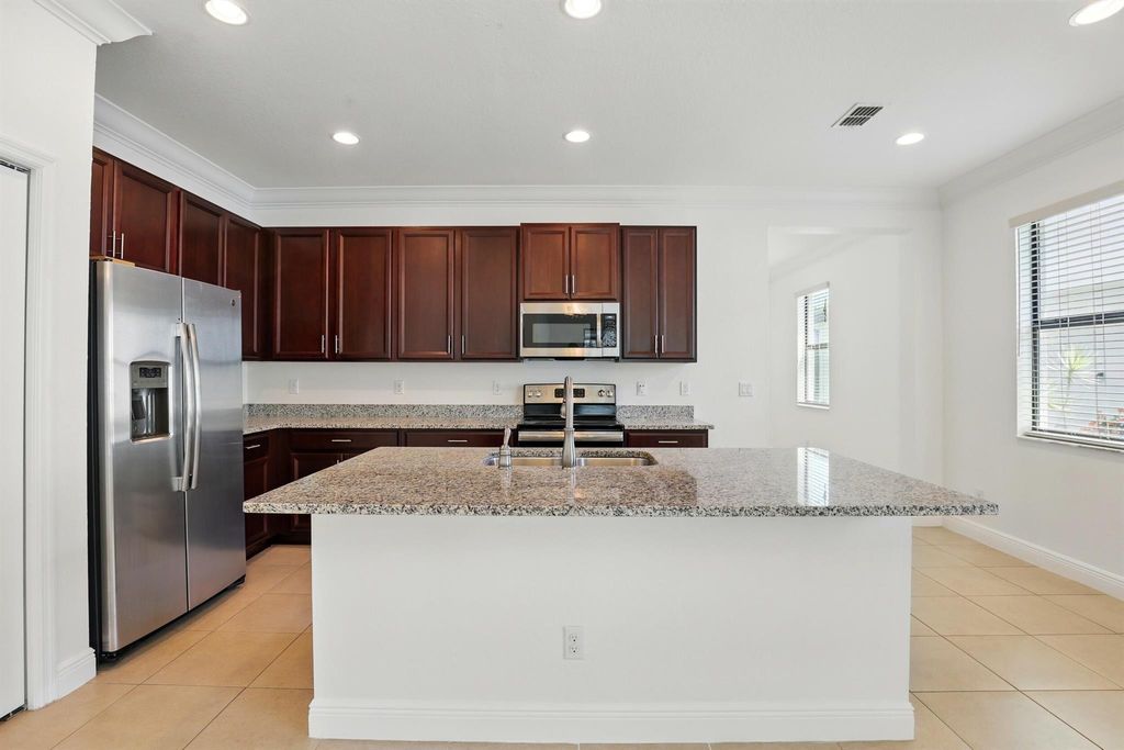 Photo of 228 SE Via Visconti, Port Saint Lucie, FL 34952 (MLS # R11105822)