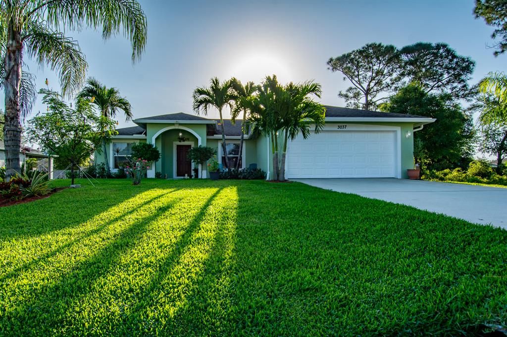 Photo of 3037 SW Segovia Street St, Port St Lucie, FL 34953 (MLS # R10785998)