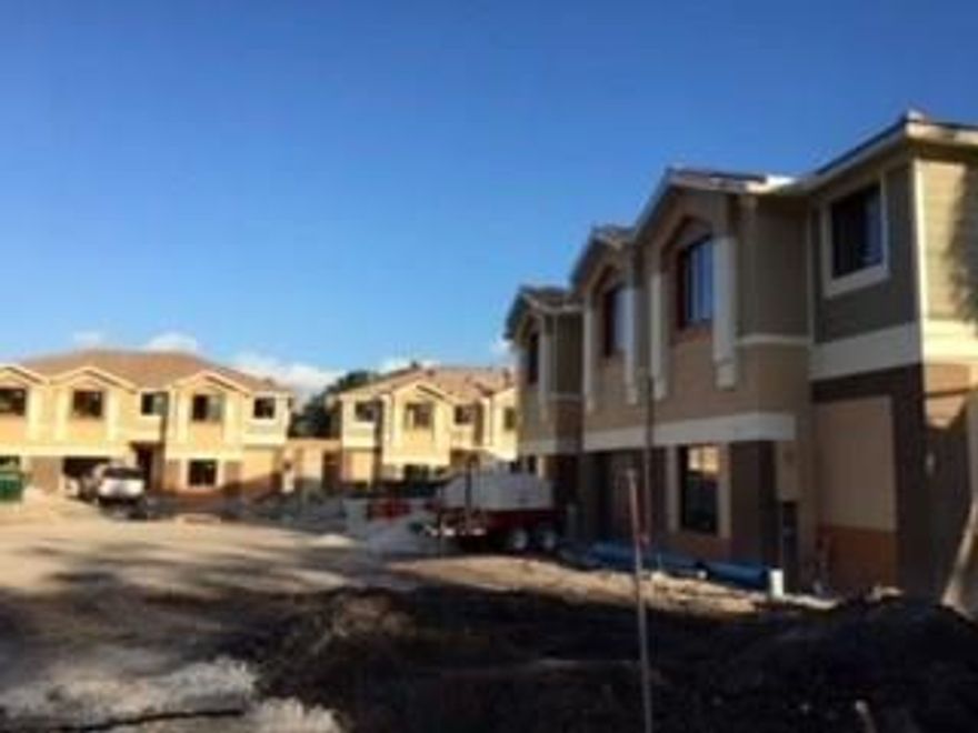 NEW HOME CONSTRUCTION * DELIVERED January 2018 Immaculate Townhome located near the heart of Davie. Best location in development.Just under 2000 sq. ft. 4/3.5 bedroom does not have a garage. Community will have 12 homes and a small family park.Close to major highways , The Hard Rock Hotel and Casino.and a short drive to the new train station with access to Miami and West Palm Beach opening in fall 2017 and will be expanded to Cocoa and Orlando to come.